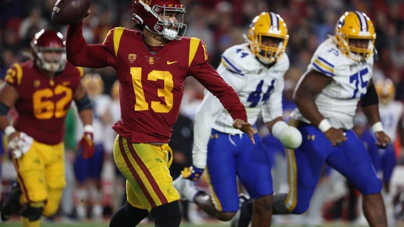 Nov 5, 2022; Los Angeles, California, USA; USC Trojans quarterback Caleb Williams (13) looks to a pass during the second quarter against the California Golden Bears at United Airlines Field at Los Angeles Memorial Coliseum. Mandatory Credit: Kiyoshi Mio-USA TODAY Sports
