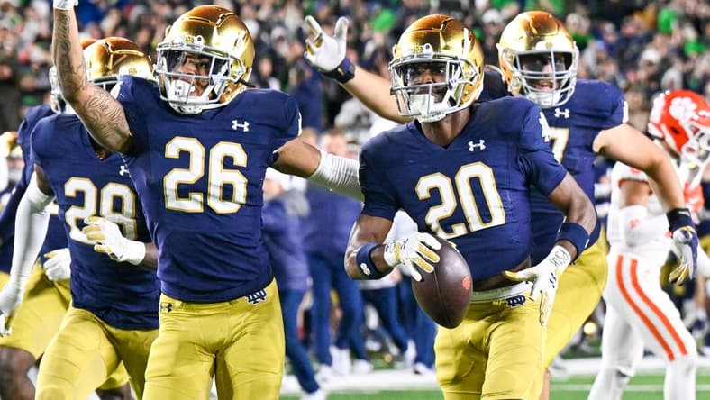 Nov 5, 2022; South Bend, Indiana, USA; Notre Dame Fighting Irish cornerback Benjamin Morrison (20) celebrates after a third quarter interception against the Clemson Tigers at Notre Dame Stadium. Mandatory Credit: Matt Cashore-USA TODAY Sports