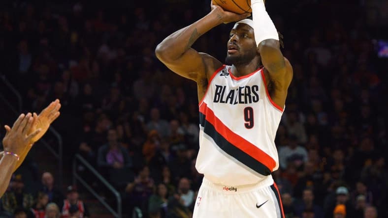 Nov 5, 2022; Phoenix, Arizona, USA; Portland Trail Blazers forward Jerami Grant (9) shoots the ball against the Phoenix Suns during the second half at Footprint Center. Mandatory Credit: Allan Henry-USA TODAY Sports