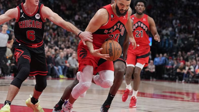 Nov 6, 2022; Toronto, Ontario, CAN; Toronto Raptors guard Fred VanVleet (23) controls the ball as Chicago Bulls guard Alex Caruso (6) tries to defend during the second quarter at Scotiabank Arena. Mandatory Credit: Nick Turchiaro-USA TODAY Sports
