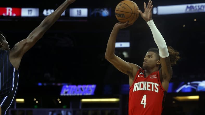 Nov 7, 2022; Orlando, Florida, USA; Houston Rockets guard Jalen Green (4) makes a three pointer against the Orlando Magic during the first quarter at Amway Center. Mandatory Credit: Kim Klement-USA TODAY Sports