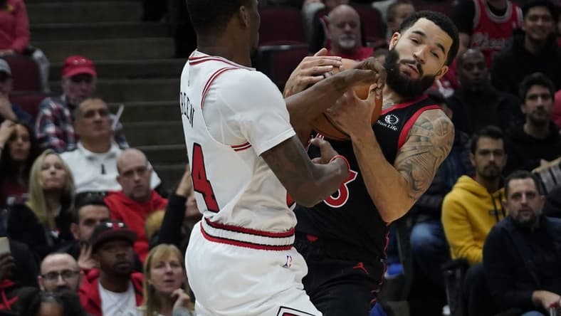 Nov 7, 2022; Chicago, Illinois, USA; Chicago Bulls forward Javonte Green (24) and Toronto Raptors guard Fred VanVleet (23) go for the ball during the first half at United Center. Mandatory Credit: David Banks-USA TODAY Sports