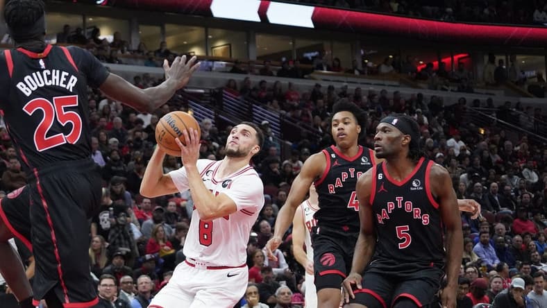 Nov 7, 2022; Chicago, Illinois, USA; Chicago Bulls guard Zach LaVine (8) goes to the basket against the Toronto Raptors during the first half at United Center. Mandatory Credit: David Banks-USA TODAY Sports