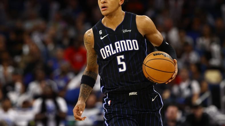 Nov 7, 2022; Orlando, Florida, USA; Orlando Magic forward Paolo Banchero (5) drives to the basket against the Houston Rockets during the second half at Amway Center. Mandatory Credit: Kim Klement-USA TODAY Sports