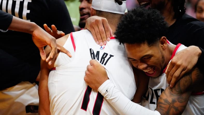 Nov 7, 2022; Miami, Florida, USA; Portland Trail Blazers guard Josh Hart (11) celebrates the game winning basket with team mates against the Miami Heat during the fourth quarter at FTX Arena. Mandatory Credit: Rich Storry-USA TODAY Sports
