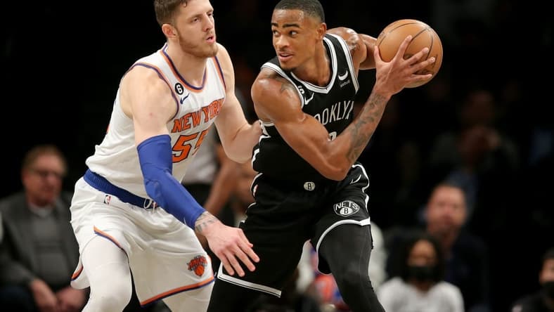 Nov 9, 2022; Brooklyn, New York, USA; Brooklyn Nets forward Nic Claxton (33) controls the ball against New York Knicks center Isaiah Hartenstein (55) during the first quarter at Barclays Center. Mandatory Credit: Brad Penner-USA TODAY Sports