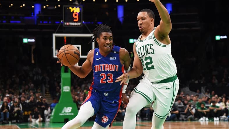 Nov 9, 2022; Boston, Massachusetts, USA; Detroit Pistons guard Jaden Ivey (23) drives to the basket while Boston Celtics forward Grant Williams (12) defends during the first half at TD Garden. Mandatory Credit: Bob DeChiara-USA TODAY Sports