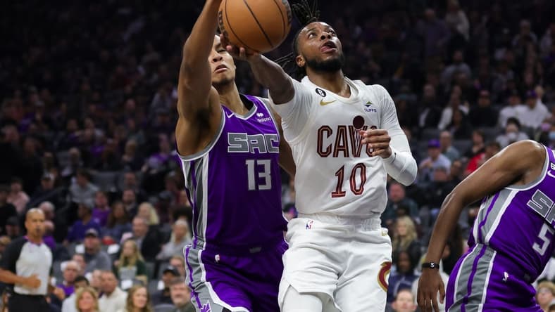 Nov 9, 2022; Sacramento, California, USA; Sacramento Kings forward Keegan Murray (13) blocks a shot by Cleveland Cavaliers guard Darius Garland (10) during the second quarter at Golden 1 Center. Mandatory Credit: Sergio Estrada-USA TODAY Sports