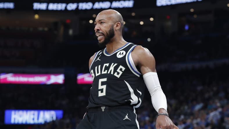 Nov 9, 2022; Oklahoma City, Oklahoma, USA; Milwaukee Bucks guard Jevon Carter (5) celebrates after scoring against the Oklahoma City Thunder during the second half at Paycom Center. Milwaukee won 136-132 in double overtime. Mandatory Credit: Alonzo Adams-USA TODAY Sports