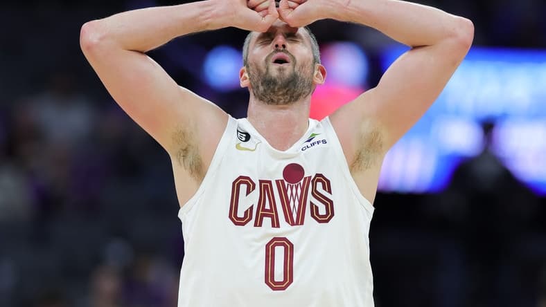 Nov 9, 2022; Sacramento, California, USA; Cleveland Cavaliers forward Kevin Love (0) reacts after a play during the fourth quarter against the Sacramento Kings at Golden 1 Center. Mandatory Credit: Sergio Estrada-USA TODAY Sports