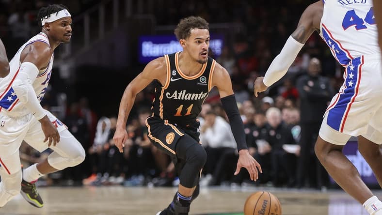 Nov 10, 2022; Atlanta, Georgia, USA; Atlanta Hawks guard Trae Young (11) dribbles against the Philadelphia 76ers in the second half at State Farm Arena. Mandatory Credit: Brett Davis-USA TODAY Sports