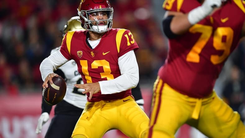 Nov 11, 2022; Los Angeles, California, USA; Southern California Trojans quarterback Caleb Williams (13) throws against the Colorado Buffaloes during the first half at the Los Angeles Memorial Coliseum. Mandatory Credit: Gary A. Vasquez-USA TODAY Sports