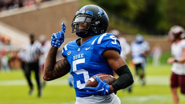 Nov 12, 2022; Durham, North Carolina, USA; Duke Blue Devils wide receiver Jalon Calhoun (5) makes a touchdown during the first half against Virginia Tech at Wallace Wade Stadium. Mandatory Credit: Jaylynn Nash-USA TODAY Sports