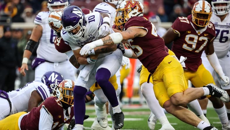 Nov 12, 2022; Minneapolis, Minnesota, USA;Minnesota Golden Gophers linebacker Cody Lindenberg (45) tackles Northwestern Wildcats quarterback Brendan Sullivan (10) during the first quarter at Huntington Bank Stadium. Mandatory Credit: Matt Krohn-USA TODAY Sports