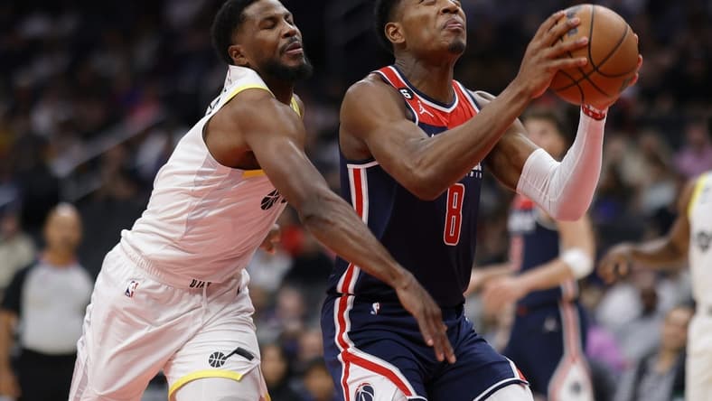 Nov 12, 2022; Washington, District of Columbia, USA; Washington Wizards forward Rui Hachimura (8) dribbles the ball as Utah Jazz guard Malik Beasley (5) defends in the first quarter at Capital One Arena. Mandatory Credit: Geoff Burke-USA TODAY Sports