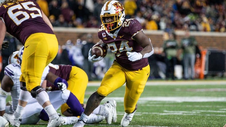 Nov 12, 2022; Minneapolis, Minnesota, USA; Minnesota Golden Gophers running back Mohamed Ibrahim (24) runs the ball against the Northwestern Wildcats during the third quarter at Huntington Bank Stadium. Mandatory Credit: Matt Krohn-USA TODAY Sports