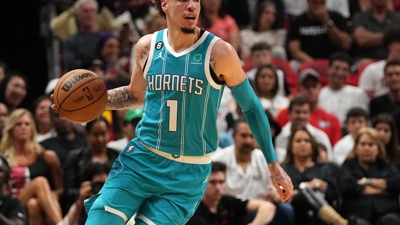 Nov 12, 2022; Miami, Florida, USA; Charlotte Hornets guard LaMelo Ball (1) controls the ball against the Miami Heat during the first half at FTX Arena. Mandatory Credit: Jasen Vinlove-USA TODAY Sports