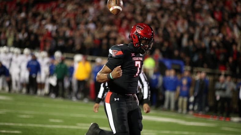 Nov 12, 2022; Lubbock, Texas, USA; Texas Tech Red Raiders quarterback Donovan Smith (7) reacts after scoring a touchdown against the Kansas Jayhawks in the second half at Jones AT&T Stadium and Cody Campbell Field. Mandatory Credit: Michael C. Johnson-USA TODAY Sports