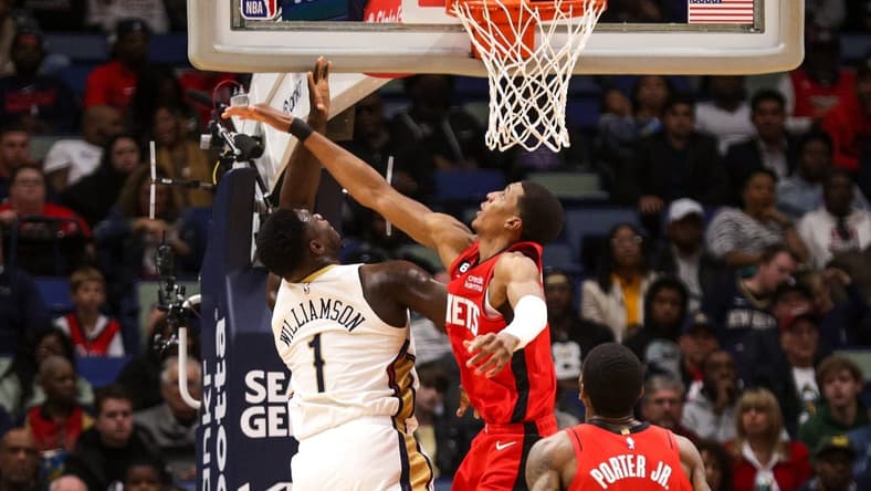 Nov 12, 2022; New Orleans, Louisiana, USA; New Orleans Pelicans forward Zion Williamson (1) shoots over Houston Rockets forward Jabari Smith Jr. (1) during the first half at Smoothie King Center. Mandatory Credit: Stephen Lew-USA TODAY Sports