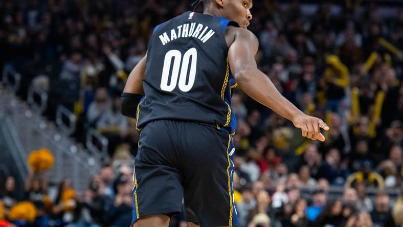 Nov 12, 2022; Indianapolis, Indiana, USA; Indiana Pacers guard Bennedict Mathurin (00) celebrates a made basket in the second half against the Toronto Raptors at Gainbridge Fieldhouse. Mandatory Credit: Trevor Ruszkowski-USA TODAY Sports
