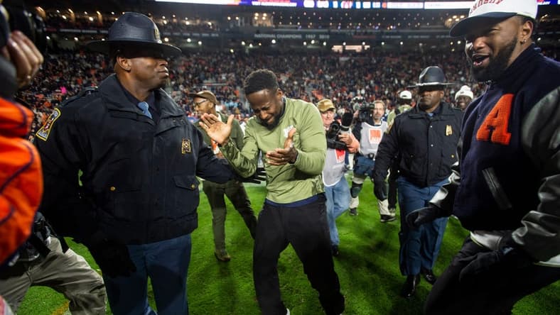 Auburn Tigers interim head coach Carnell "Cadillac" Williams celebrates after the game as Auburn Tigers take on Texas A&M Aggies at Jordan-Hare Stadium in Auburn, Ala., on Saturday, Nov. 12, 2022. Auburn Tigers defeated Texas A&M Aggies 13-10.