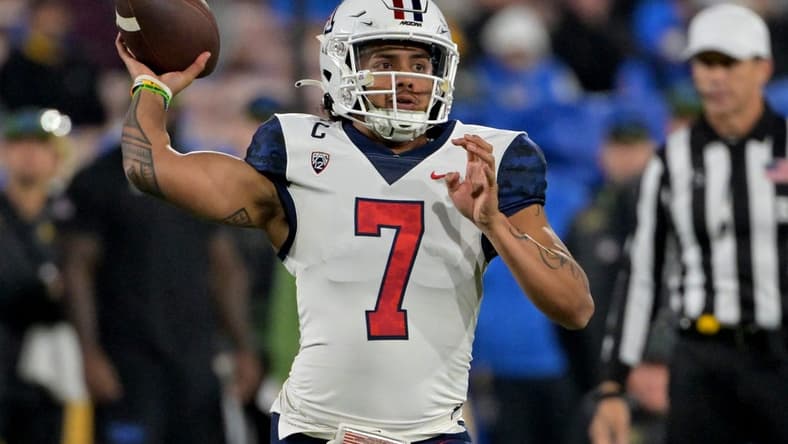Nov 12, 2022; Pasadena, California, USA;  Arizona Wildcats quarterback Jayden de Laura (7) passes the ball in the first half against the UCLA Bruins at the Rose Bowl. Mandatory Credit: Jayne Kamin-Oncea-USA TODAY Sports