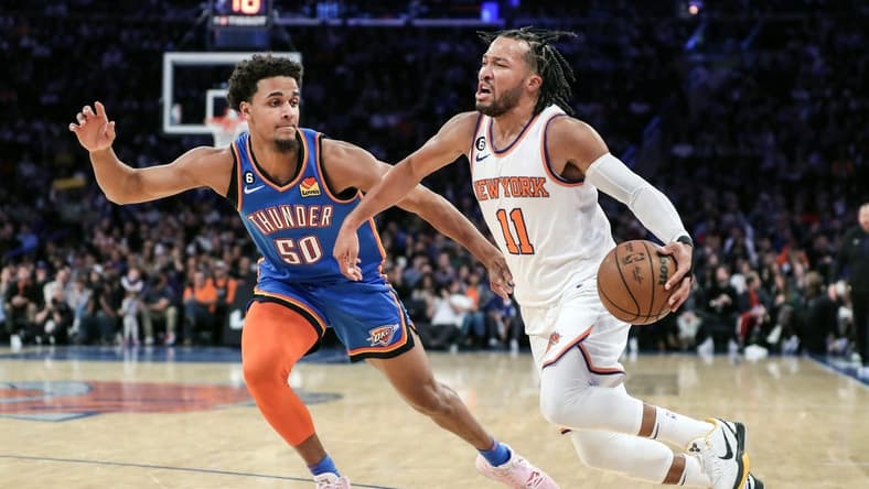 Nov 13, 2022; New York, New York, USA; New York Knicks guard Jalen Brunson (11) drives past Oklahoma City Thunder forward Jeremiah Robinson-Earl (50) in the first half at Madison Square Garden. Mandatory Credit: Wendell Cruz-USA TODAY Sports