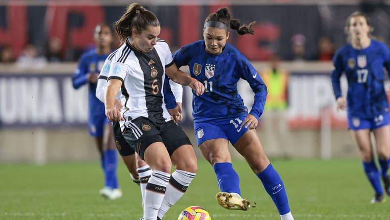 Nov 13, 2022; Harrison, New Jersey, USA; United States forward Sophia Smith (11) plays the ball against Germany forward Lena Oberdorf (6) uring the first half at Red Bull Arena. Mandatory Credit: Vincent Carchietta-USA TODAY Sports