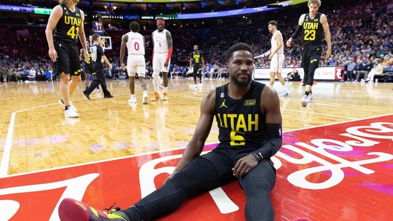 Nov 13, 2022; Philadelphia, Pennsylvania, USA; Utah Jazz guard Malik Beasley (5) sits on the court after missing on a drive attempt against the Philadelphia 76ers during the third quarter at Wells Fargo Center. Mandatory Credit: Bill Streicher-USA TODAY Sports