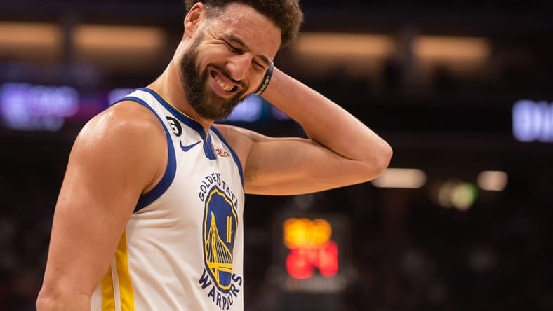 Nov 13, 2022; Sacramento, California, USA; Golden State Warriors guard Klay Thompson (11) reacts to a missed shot during the fourth quarter against the Sacramento Kings at Golden 1 Center. Mandatory Credit: Ed Szczepanski-USA TODAY Sports