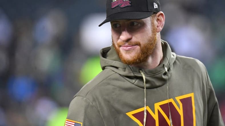 Nov 14, 2022; Philadelphia, Pennsylvania, USA; Washington Commanders quarterback Carson Wentz (11) during warmups against the Philadelphia Eagles at Lincoln Financial Field. Mandatory Credit: Eric Hartline-USA TODAY Sports