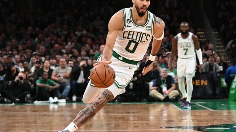 Nov 14, 2022; Boston, Massachusetts, USA; Boston Celtics forward Jayson Tatum (0) dribbles the ball up the court  during the first half of a game against the Oklahoma City Thunder at the TD Garden. Mandatory Credit: Brian Fluharty-USA TODAY Sports