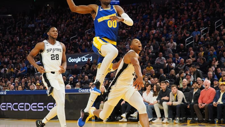 Nov 14, 2022; San Francisco, California, USA; Golden State Warriors forward Jonathan Kuminga (00) drives for a dunk against the San Antonio Spurs during the third quarter at Chase Center. Mandatory Credit: Kelley L Cox-USA TODAY Sports