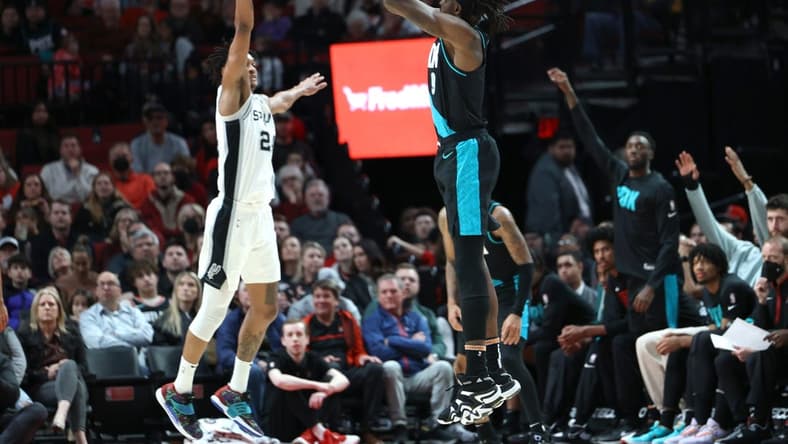 Nov 15, 2022; Portland, Oregon, USA; Portland Trail Blazers forward Jerami Grant (9) shoots the ball in a game against the San Antonio Spurs in the first half at Moda Center. Mandatory Credit: Jaime Valdez-USA TODAY Sports