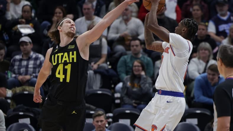 Nov 15, 2022; Salt Lake City, Utah, USA; Utah Jazz forward Kelly Olynyk (41) tries to block the shot of New York Knicks forward Cam Reddish (0) during the second half at Vivint Arena. Mandatory Credit: Chris Nicoll-USA TODAY Sports