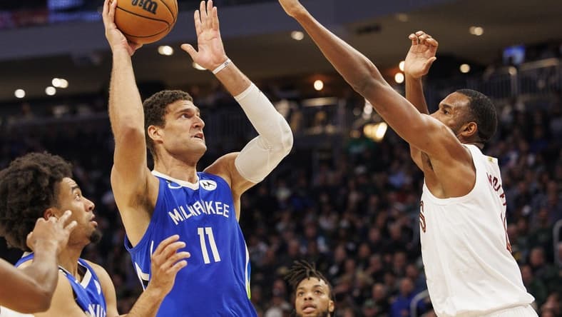 Nov 16, 2022; Milwaukee, Wisconsin, USA; Milwaukee Bucks center Brook Lopez (11) shoots during the second quarter against the Cleveland Cavaliers at Fiserv Forum. Mandatory Credit: Jeff Hanisch-USA TODAY Sports