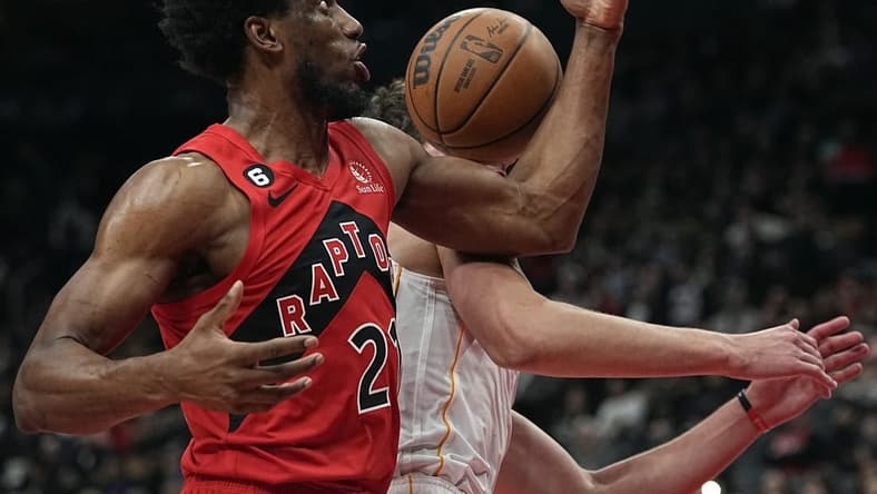 Nov 16, 2022; Toronto, Ontario, CAN; Toronto Raptors forward Thaddeus Young (21) goes to grab a rebound against the Miami Heat during the second half at Scotiabank Arena. Mandatory Credit: John E. Sokolowski-USA TODAY Sports