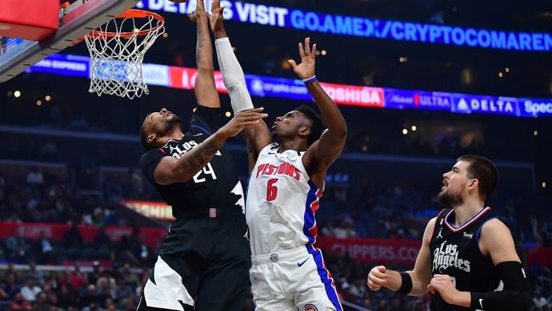 Nov 17, 2022; Los Angeles, California, USA;Los Angeles Clippers forward Norman Powell (24) shoots against Detroit Pistons guard Hamidou Diallo (6) during the first half at Crypto.com Arena. Mandatory Credit: Gary A. Vasquez-USA TODAY Sports