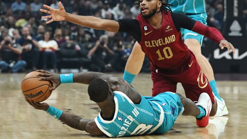 Nov 18, 2022; Cleveland, Ohio, USA; Cleveland Cavaliers guard Darius Garland (10) goes for the ball as Charlotte Hornets guard Terry Rozier (3) tries to pass from the floor during the first quarter at Rocket Mortgage FieldHouse. Mandatory Credit: Ken Blaze-USA TODAY Sports