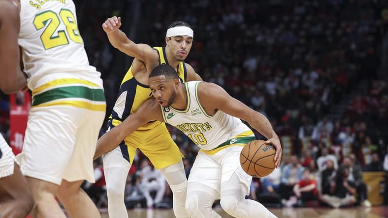 Nov 18, 2022; Houston, Texas, USA; Houston Rockets guard Eric Gordon (10) controls the ball as Indiana Pacers guard Andrew Nembhard (2) defends during the second quarter at Toyota Center. Mandatory Credit: Troy Taormina-USA TODAY Sports