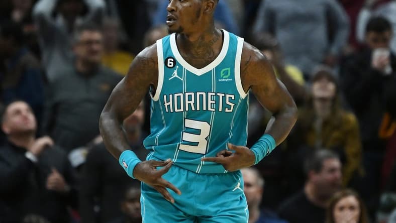 Nov 18, 2022; Cleveland, Ohio, USA; Charlotte Hornets guard Terry Rozier (3) celebrates after hitting a three point shot during overtime against the Cleveland Cavaliers at Rocket Mortgage FieldHouse. Mandatory Credit: Ken Blaze-USA TODAY Sports