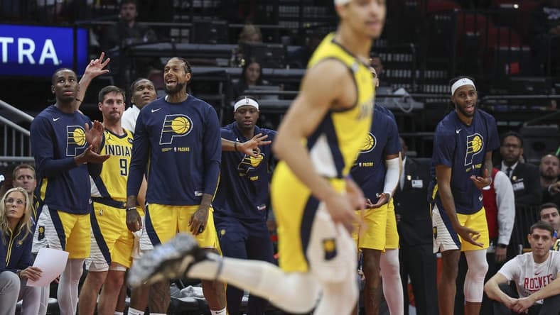 Nov 18, 2022; Houston, Texas, USA; Indiana Pacers players react after guard Andrew Nembhard (2) scores during the fourth quarter against the Houston Rockets at Toyota Center. Mandatory Credit: Troy Taormina-USA TODAY Sports