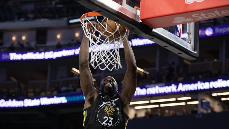 Nov 18, 2022; San Francisco, California, USA; Golden State Warriors forward Draymond Green (23) dunks against the New York Knicks during the third quarter at Chase Center. Mandatory Credit: D. Ross Cameron-USA TODAY Sports