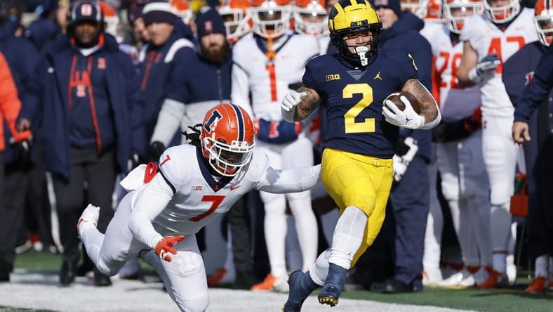 Nov 19, 2022; Ann Arbor, Michigan, USA;  Michigan Wolverines running back Blake Corum (2) rushes in the first half against the Illinois Fighting Illini at Michigan Stadium. Mandatory Credit: Rick Osentoski-USA TODAY Sports