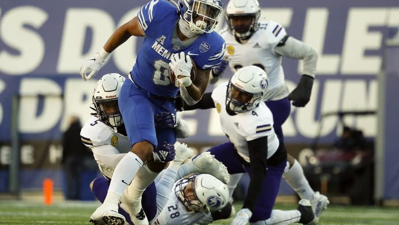 Nov 19, 2022; Memphis, Tennessee, USA; Memphis Tigers running back Jevyon Ducker (8) runs the ball during the second half against the North Alabama Lions at Simmons Bank Liberty Stadium. Mandatory Credit: Petre Thomas-USA TODAY Sports