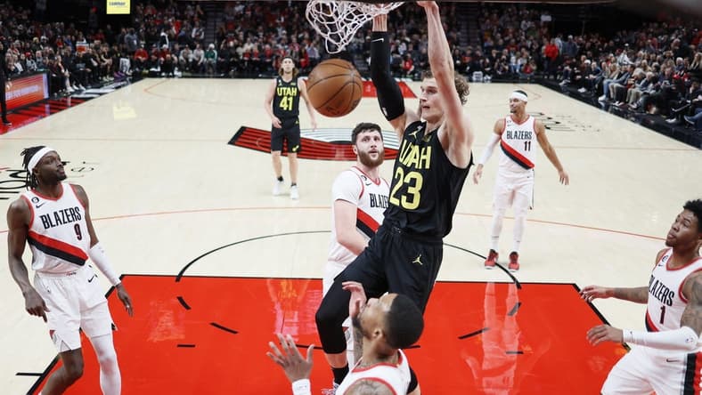 Nov 19, 2022; Portland, Oregon, USA; Utah Jazz power forward Lauri Markkanen (23) dunks the ball during the first half against the Portland Trail Blazers at Moda Center. Mandatory Credit: Soobum Im-USA TODAY Sports