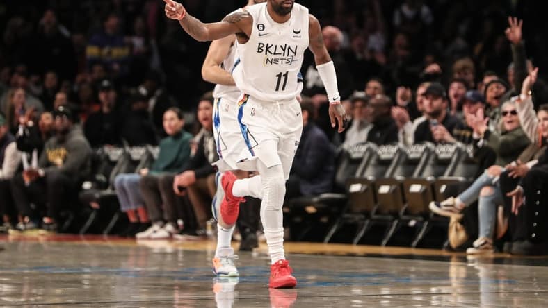 Nov 20, 2022; Brooklyn, New York, USA; Brooklyn Nets guard Kyrie Irving (11) heads back down court after scoring in the first quarter against the Memphis Grizzlies at Barclays Center. Mandatory Credit: Wendell Cruz-USA TODAY Sports