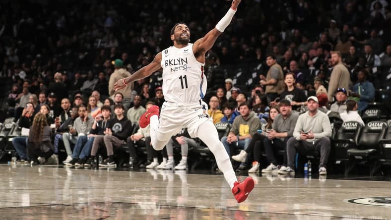 Nov 20, 2022; Brooklyn, New York, USA; Brooklyn Nets guard Kyrie Irving (11) catches an outlet pass in the third quarter against the Memphis Grizzlies at Barclays Center. Mandatory Credit: Wendell Cruz-USA TODAY Sports