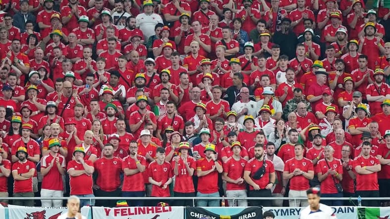 Nov 21, 2022; Al Rayyan, Qatar; Wales fans watch against the United States of America during the second half during a group stage match during the 2022 FIFA World Cup at Ahmed Bin Ali Stadium. Mandatory Credit: Danielle Parhizkaran-USA TODAY Sports