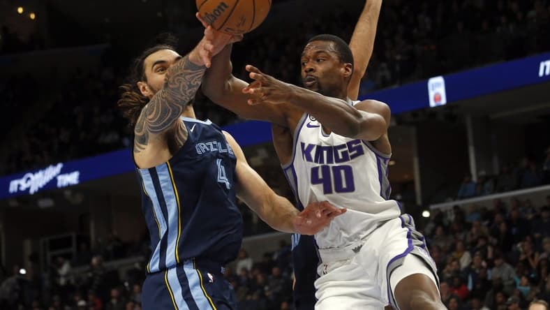 Nov 22, 2022; Memphis, Tennessee, USA; Sacramento Kings forward Harrison Barnes (40) passes the ball as Memphis Grizzlies center Steven Adams (4) defends during the first quarter at FedExForum. Mandatory Credit: Petre Thomas-USA TODAY Sports